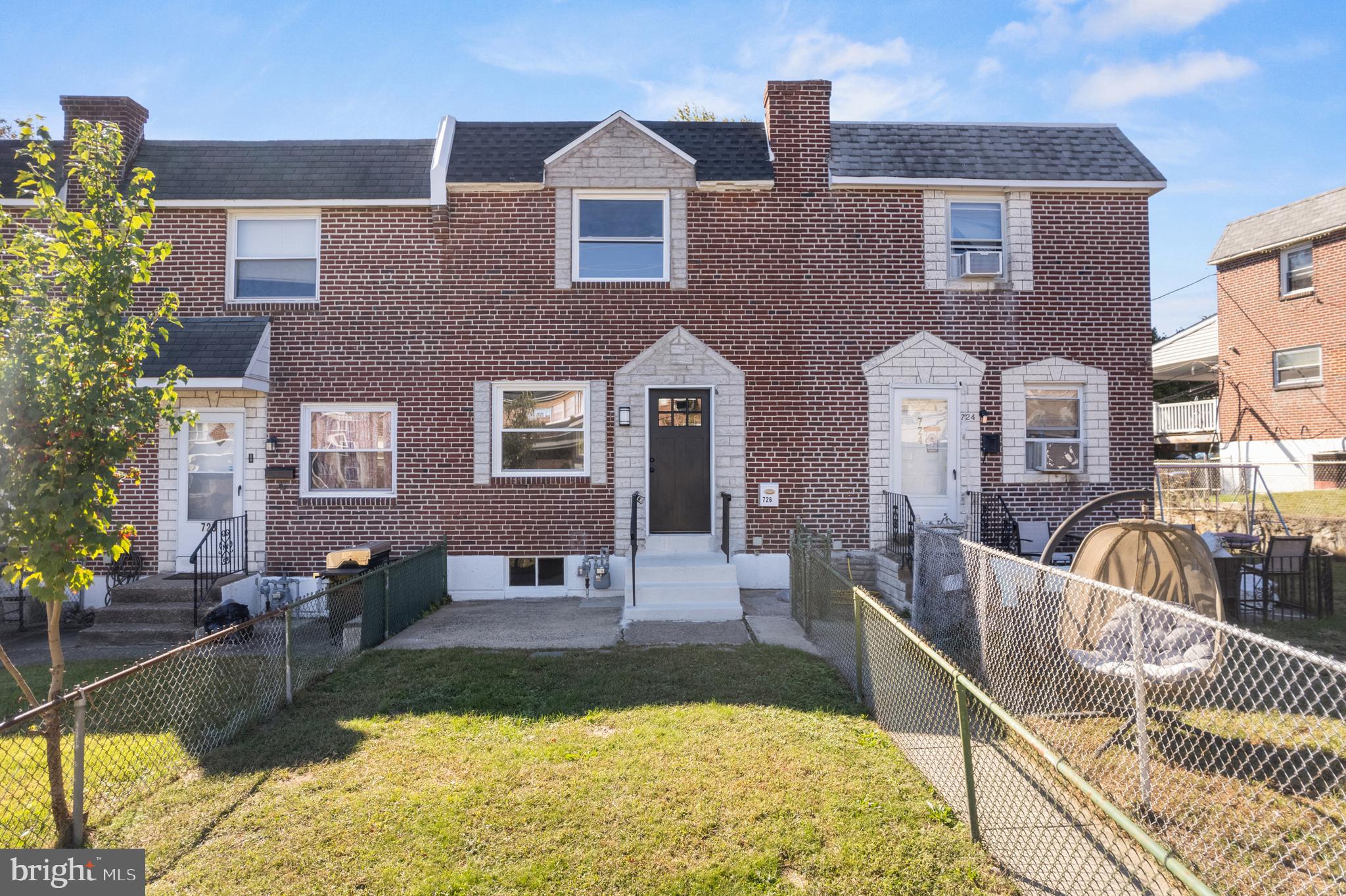 726 Grant Road Folcroft, PA 19032 - Photo 1 of 23 a front view of house with yard