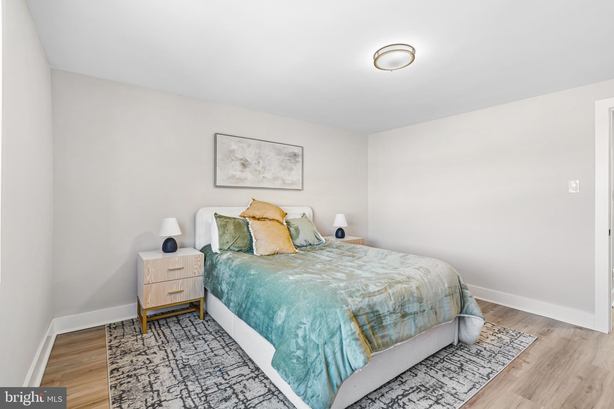 726 Grant Road Folcroft, PA 19032 - Photo 12 of 23 a bedroom with a bed and a window