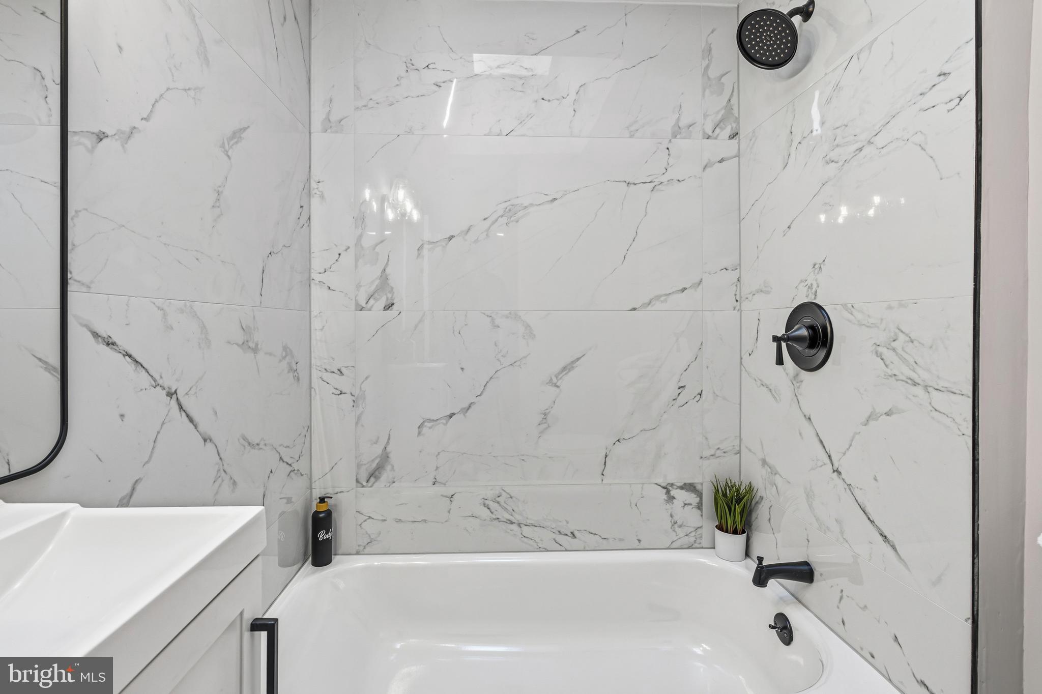 726 Grant Road Folcroft, PA 19032 - Photo 14 of 23 a bathroom with a tub sink