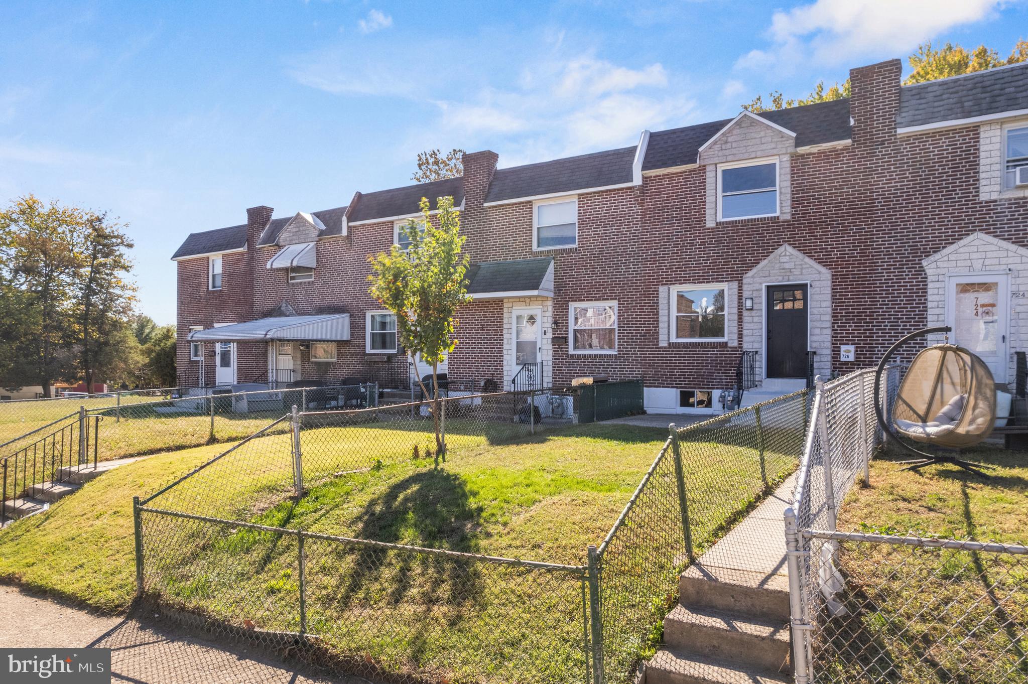 726 Grant Road Folcroft, PA 19032 - Photo 2 of 23 a view of a swimming pool with a lounge chairs