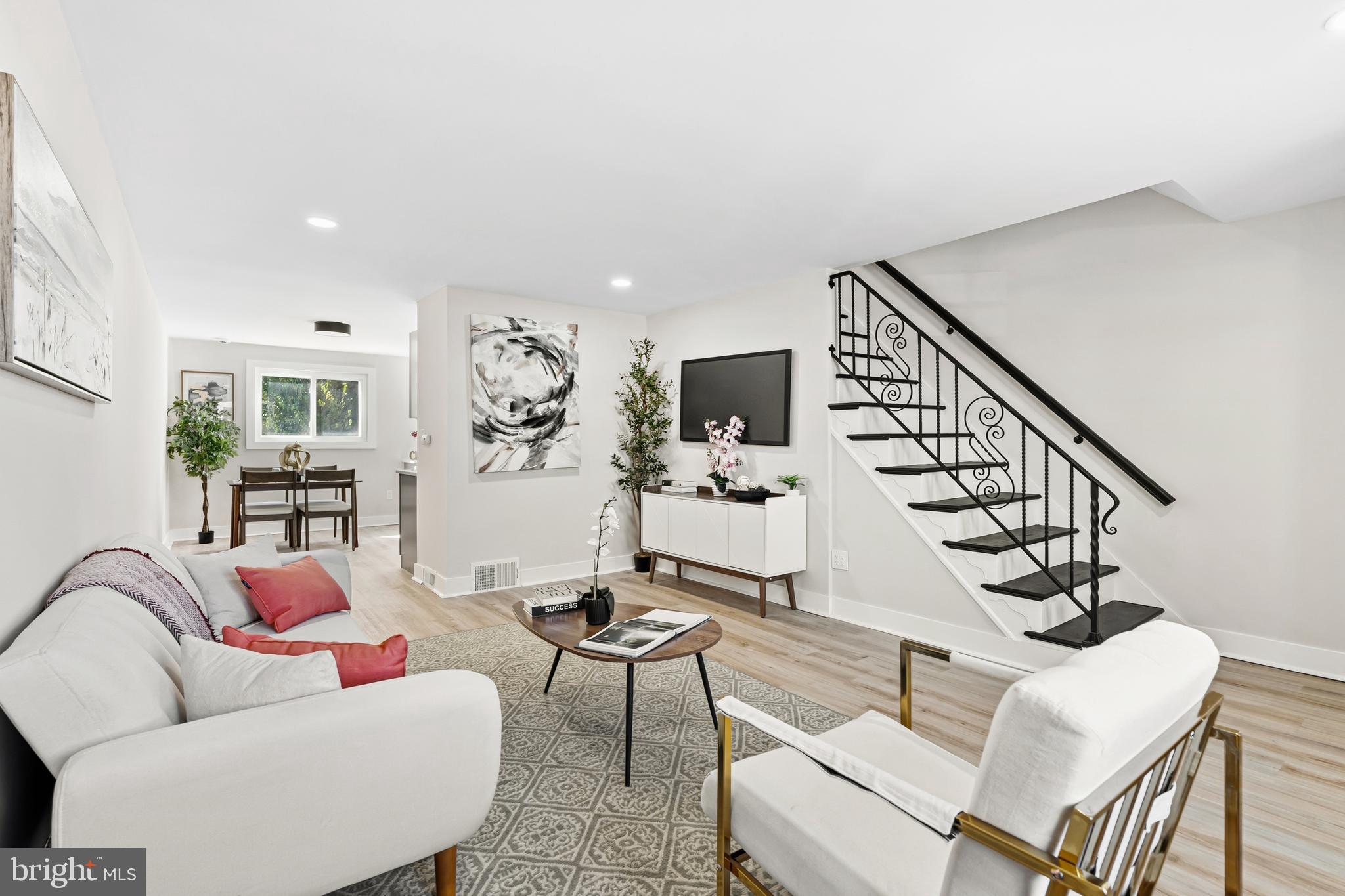 726 Grant Road Folcroft, PA 19032 - Photo 3 of 23 a living room with furniture and wooden floor