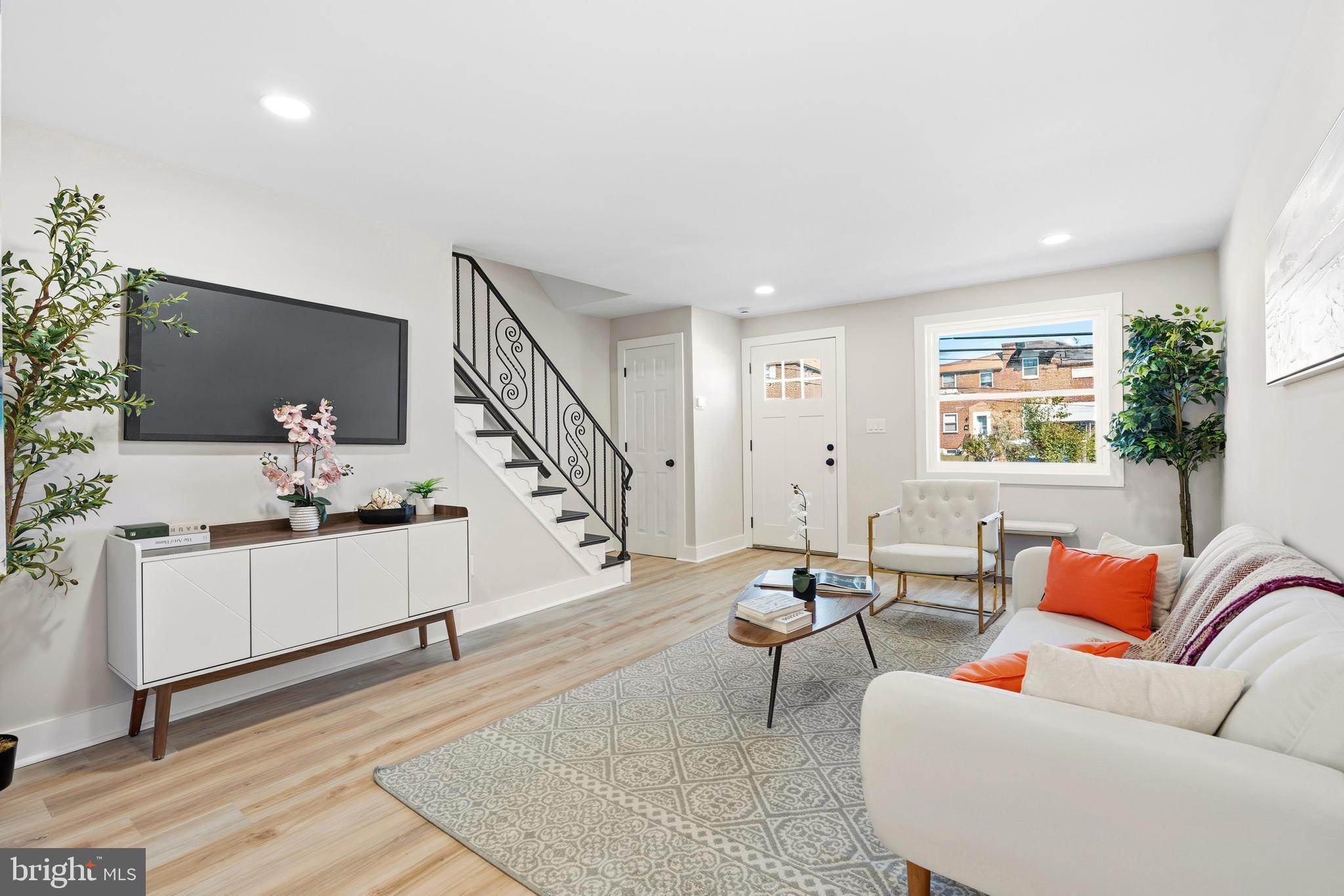 726 Grant Road Folcroft, PA 19032 - Photo 5 of 23 a living room with furniture and wooden floor