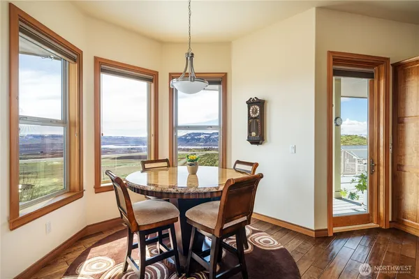 a dining room with furniture window wooden floor