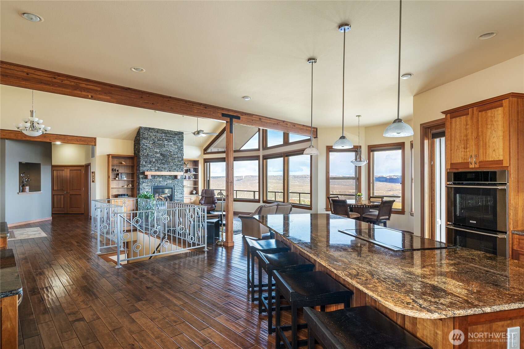 17 Vista Ridge Road Brewster, WA 98812 - Photo 14 of 40 a view of a dining room with furniture a chandelier and wooden floor