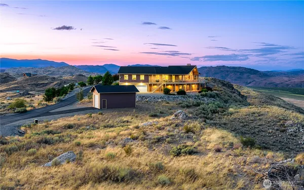 a view of a backyard with mountain view