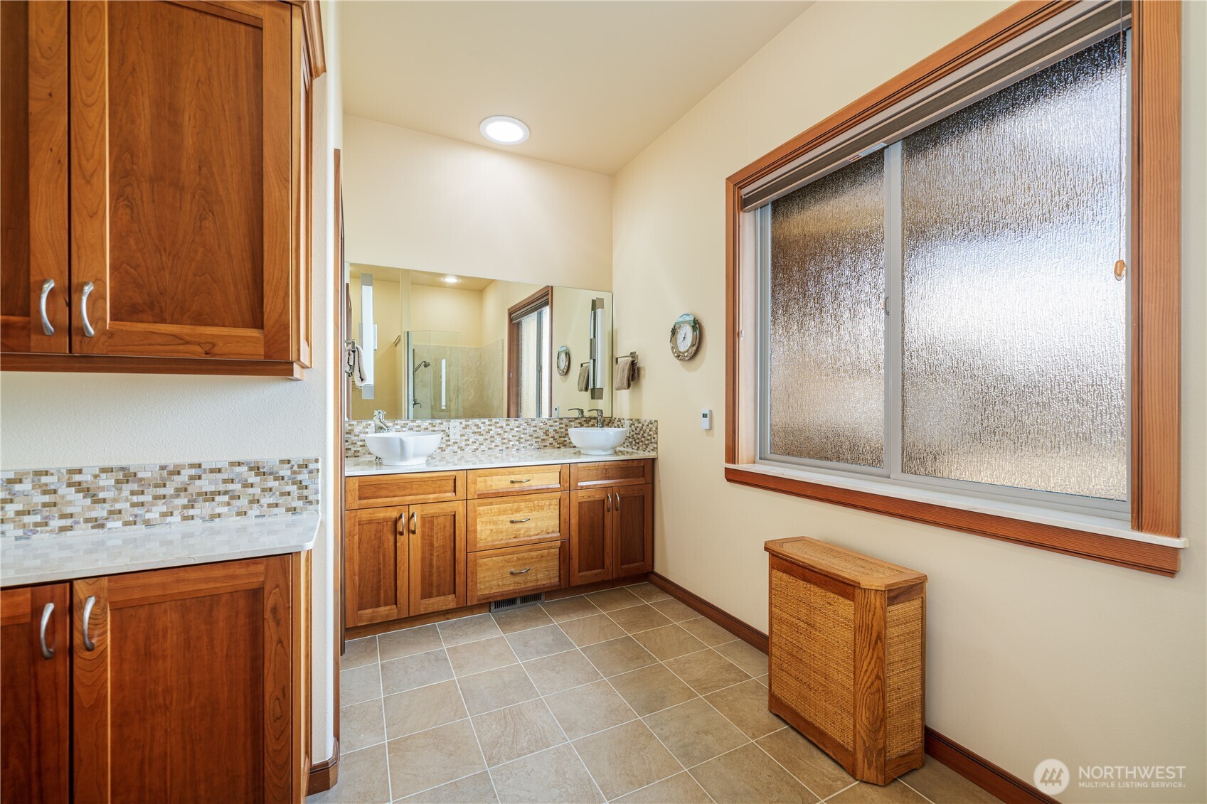 17 Vista Ridge Road Brewster, WA 98812 - Photo 21 of 40 a bathroom with a granite countertop sink and a mirror