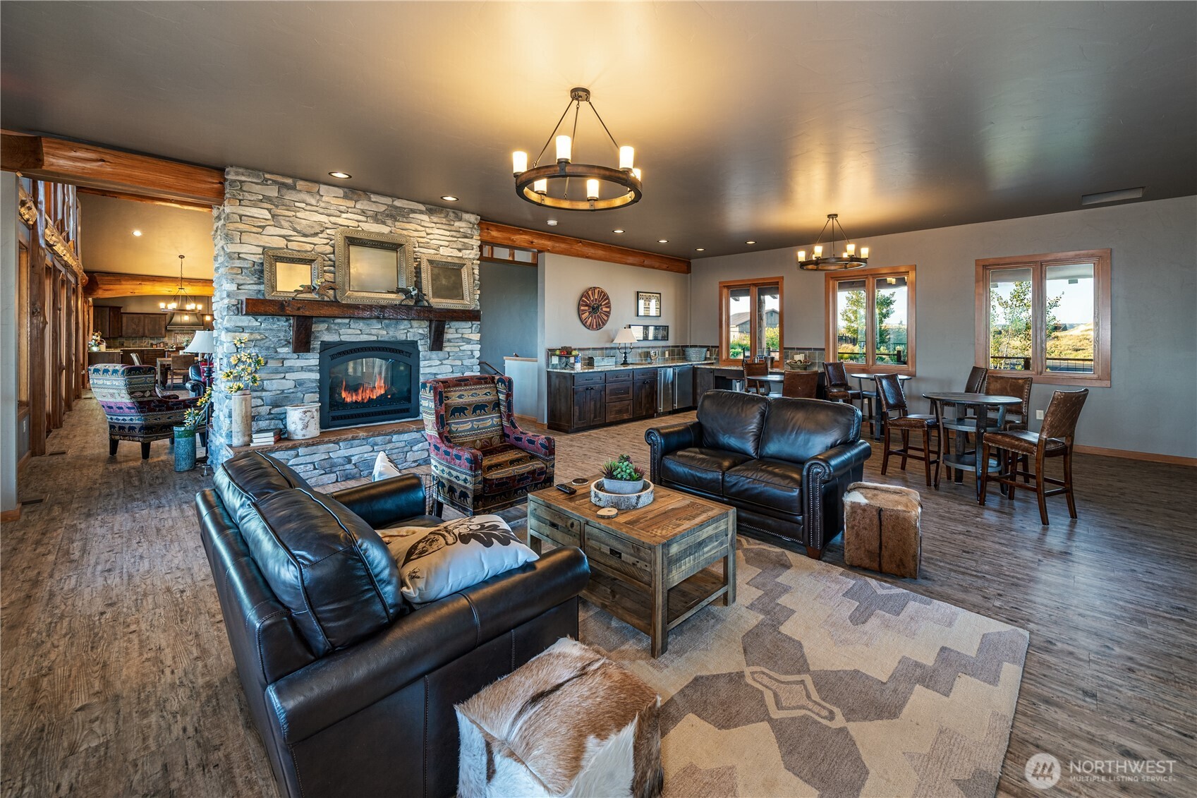 17 Vista Ridge Road Brewster, WA 98812 - Photo 34 of 40 a living room with fireplace furniture and a chandelier