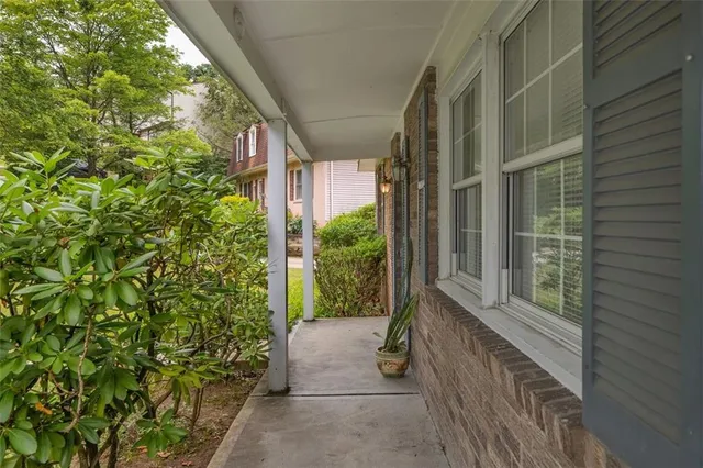 a view of house with backyard
