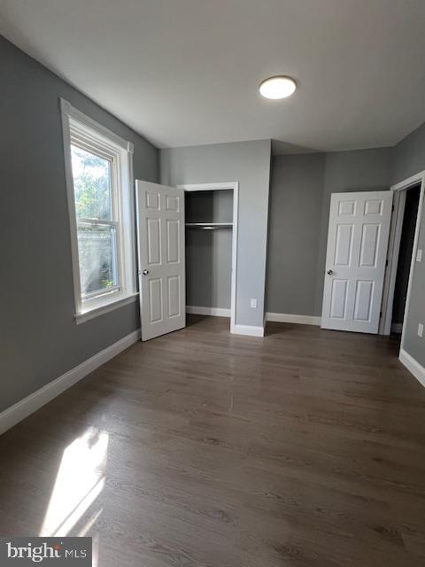 710 Main Street Darby, PA 19023 - Photo 18 of 20 an empty room with windows and closet