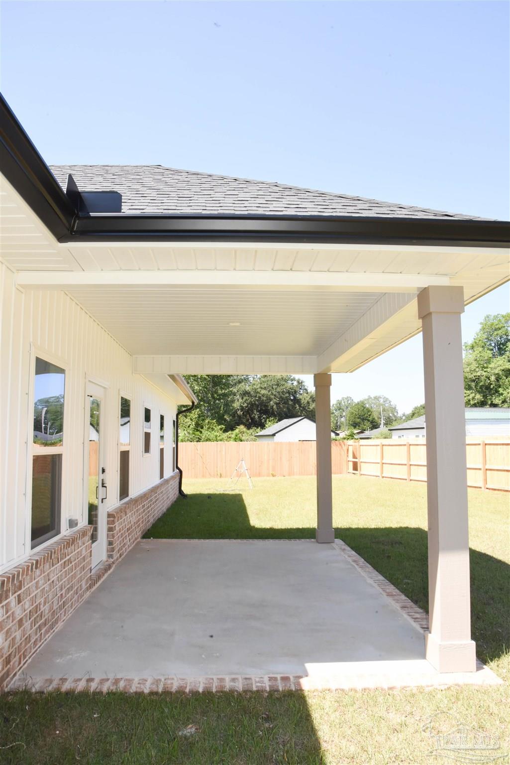 8080 Pinus Lane Pensacola, FL 32534 - Photo 23 of 25 a view of entrance gate of a house with a yard