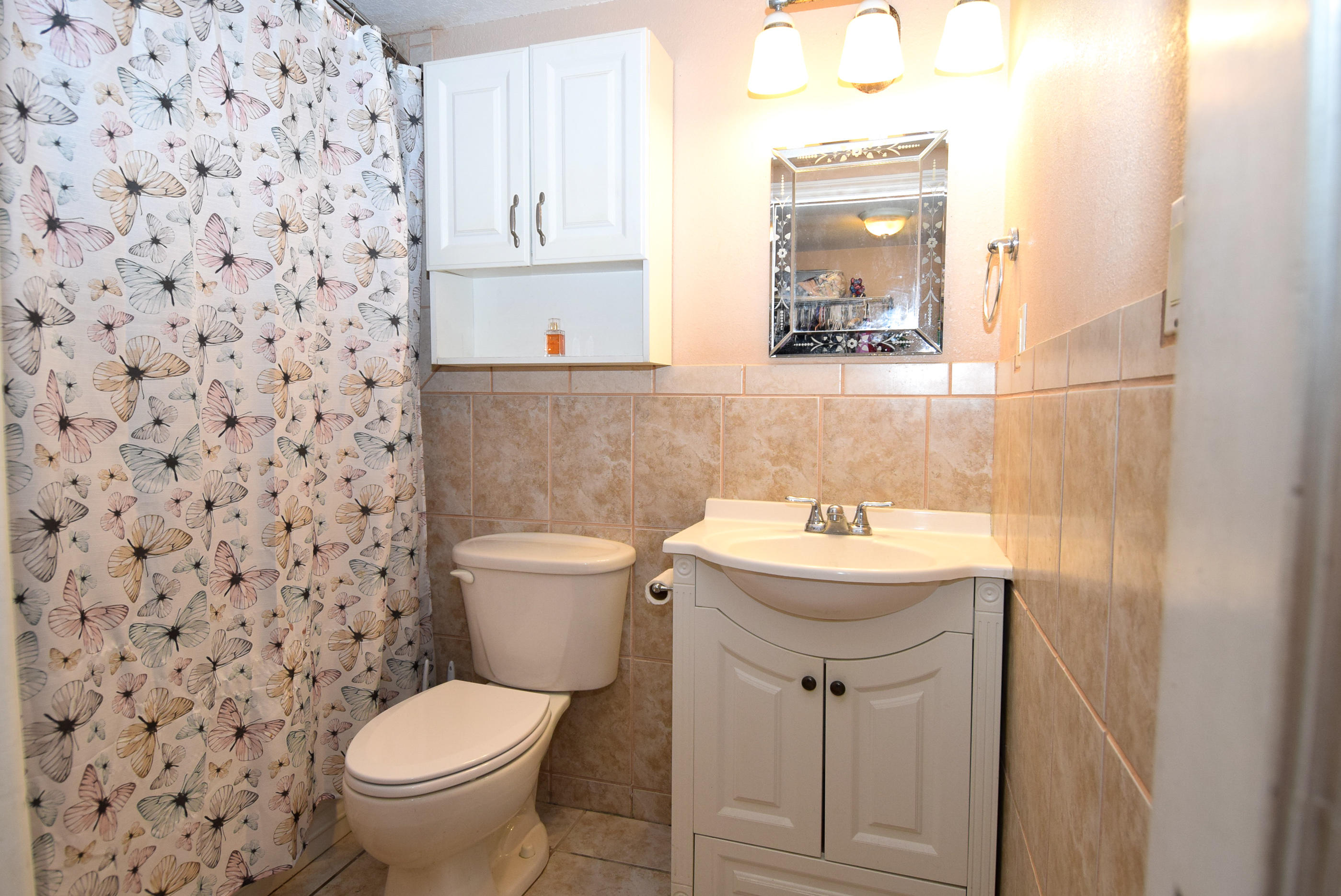 338 3rd Road Key Largo, FL 33037 - Photo 12 of 23 a bathroom with a sink toilet and mirror