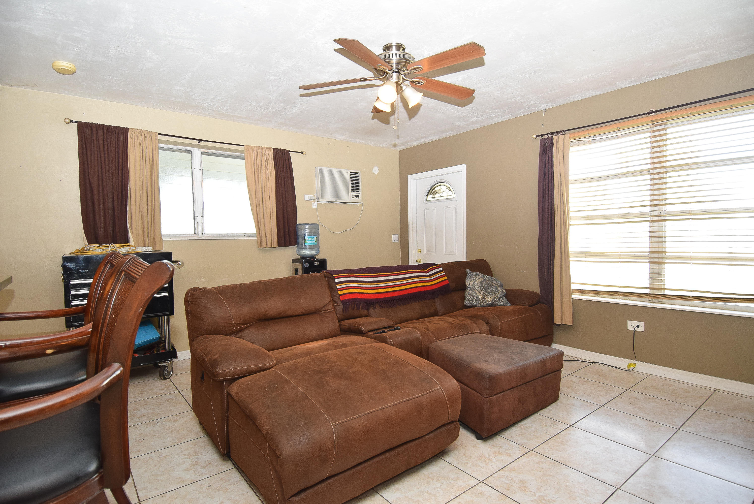 338 3rd Road Key Largo, FL 33037 - Photo 17 of 23 a living room with furniture and a large window