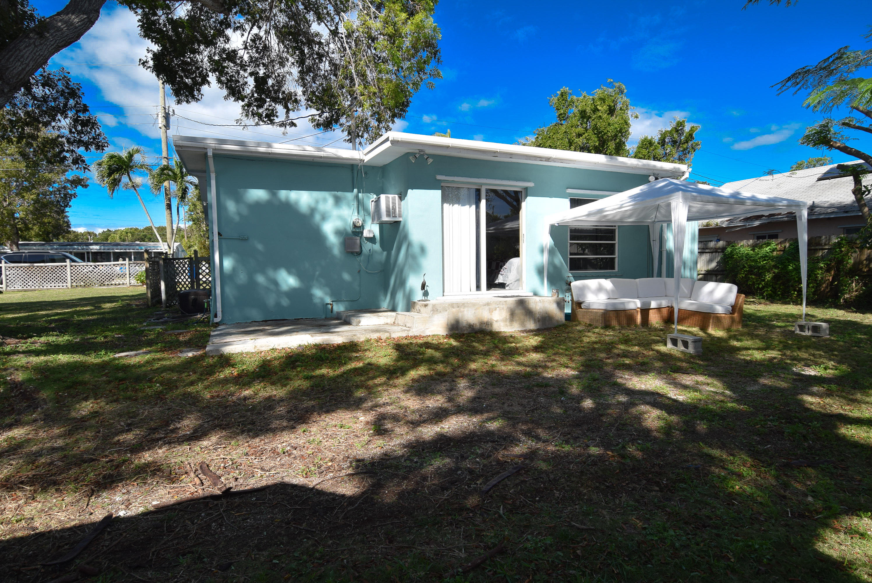 338 3rd Road Key Largo, FL 33037 - Photo 19 of 23 a front view of a house with a yard