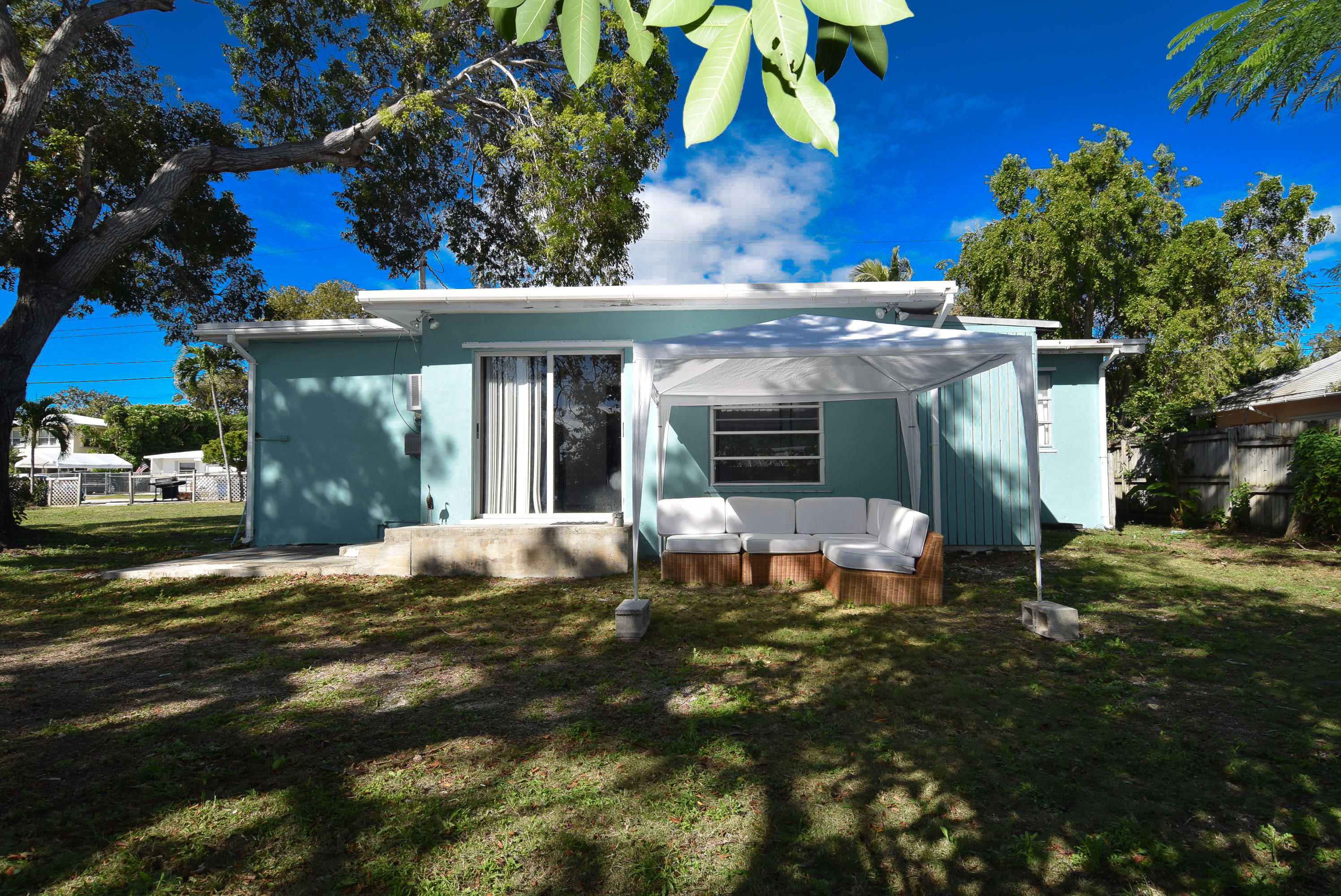 338 3rd Road Key Largo, FL 33037 - Photo 20 of 23 a front view of a house with a yard