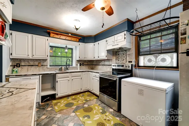 a bed room with a bed and a television