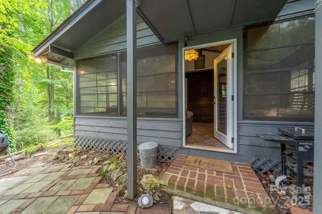 a picture of a bench in front of a wall