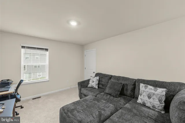 a living room with a couch