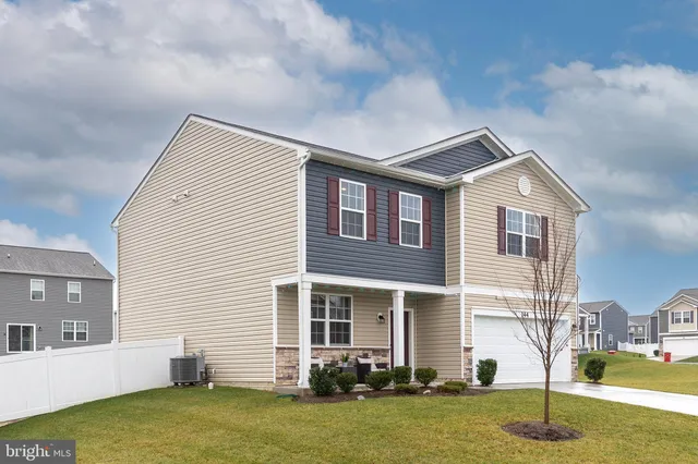 a front view of house with yard