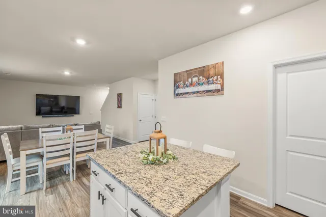 a room with a table and chairs