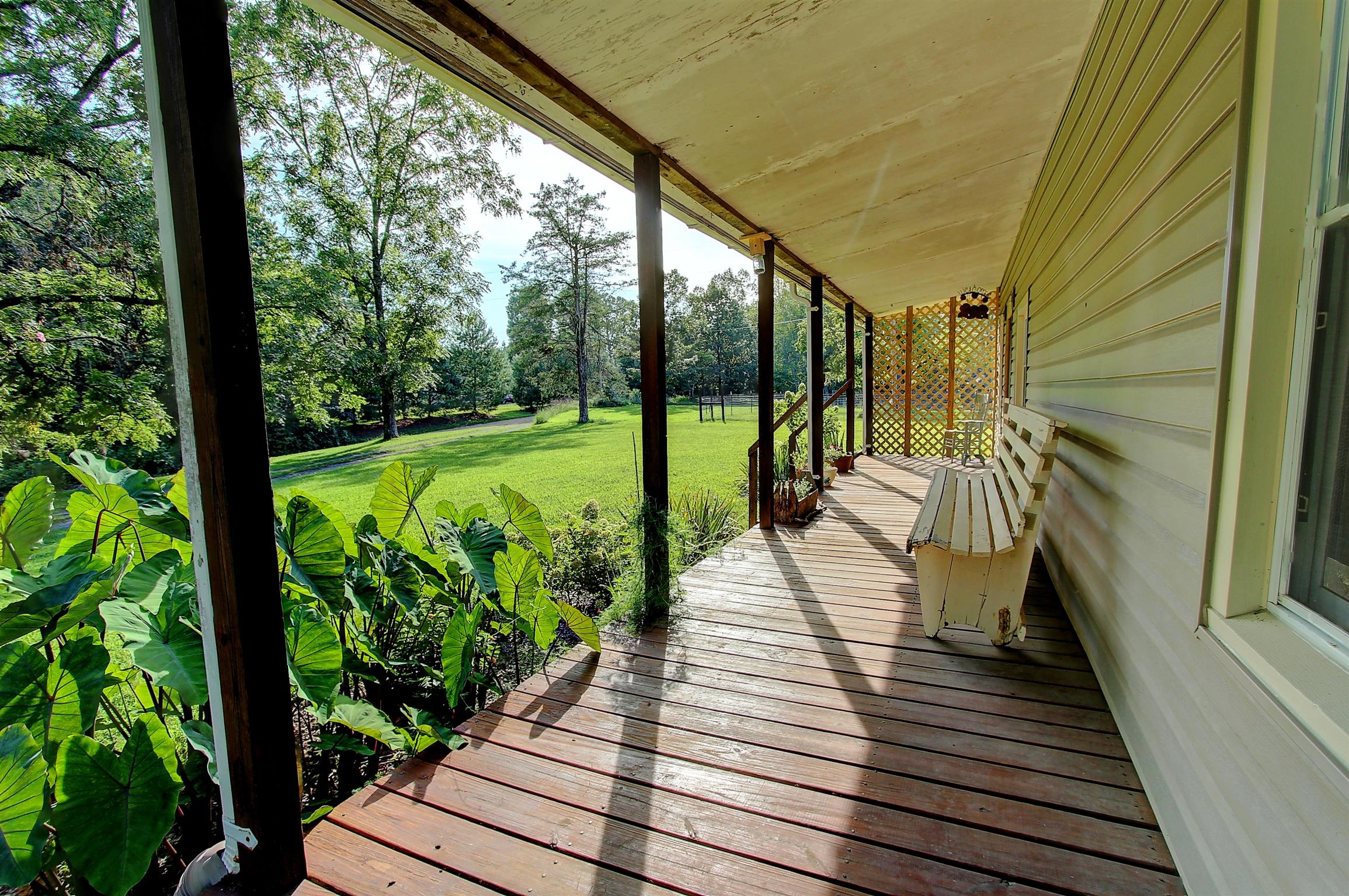 9159 Buck Litton Road Lyles, TN 37098 - Photo 3 of 21 Another view of the front porch looking out into the front yard!