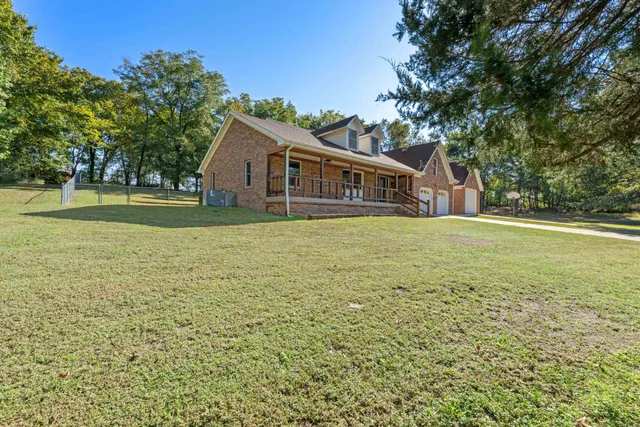 a view of a house with a big yard