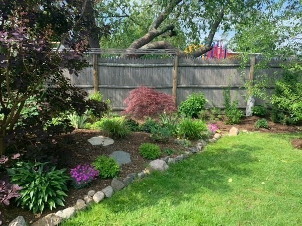 57 Leicester Road Marblehead, MA 01945 - Photo 36 of 39 a garden covered with tall trees