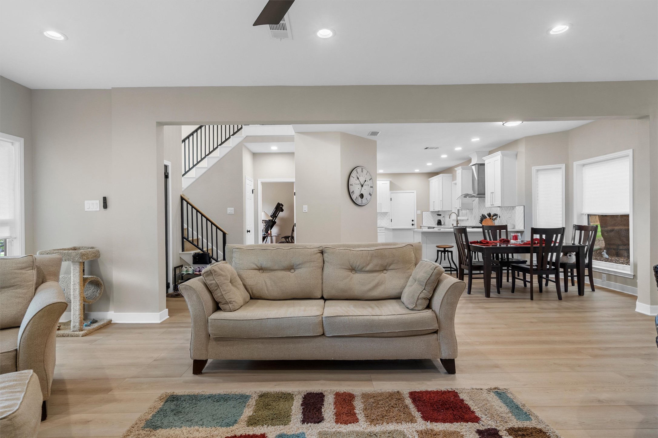 307 Hurst Creek Road Austin, TX 78734 - Photo 8 of 40 Open concept living area featuring wood-finish flooring, recessed lighting, and a neutral color palette