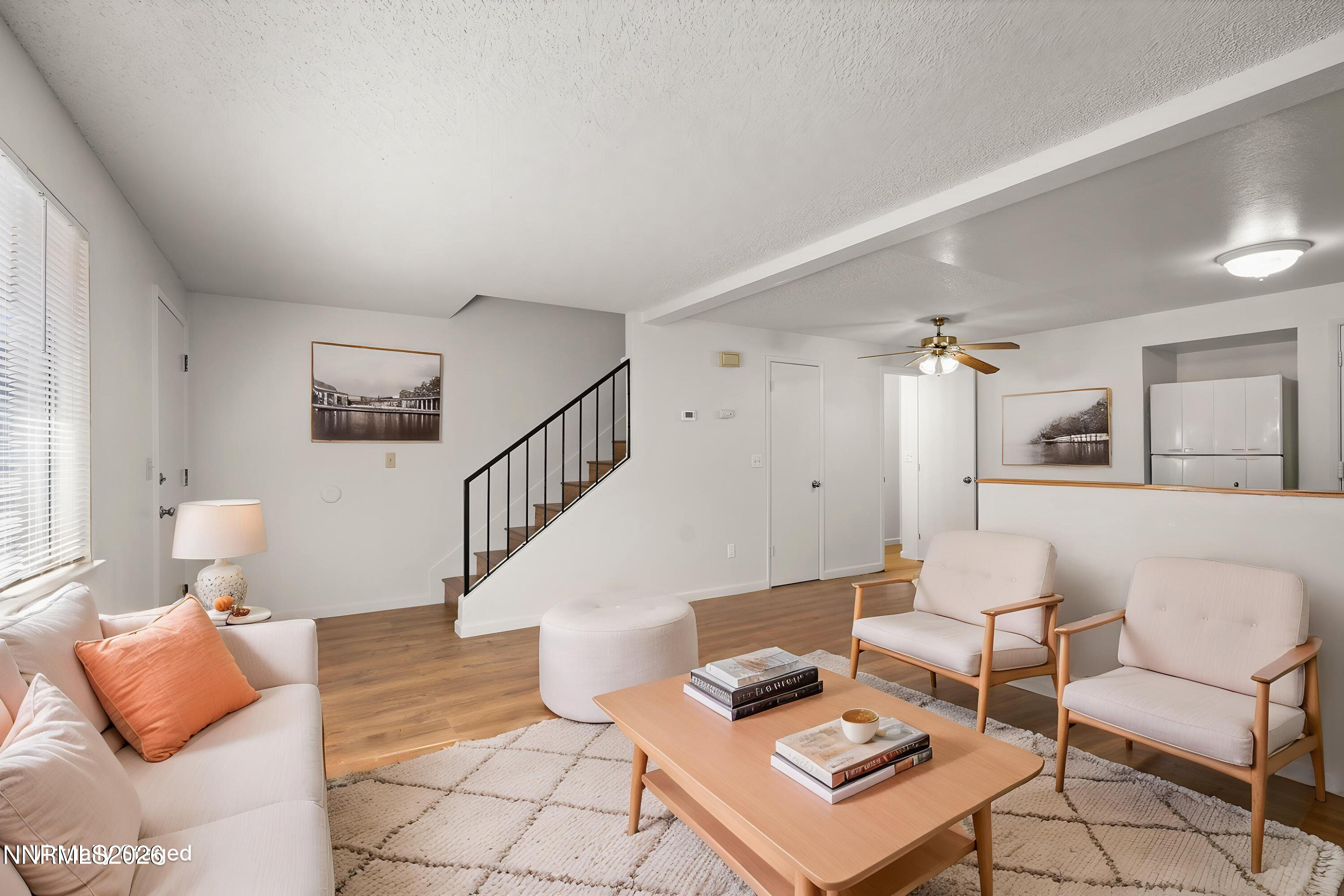 401 Allouette Way, Unit 2 Carson City, NV 89701 - Photo 5 of 29 a living room with furniture and a table