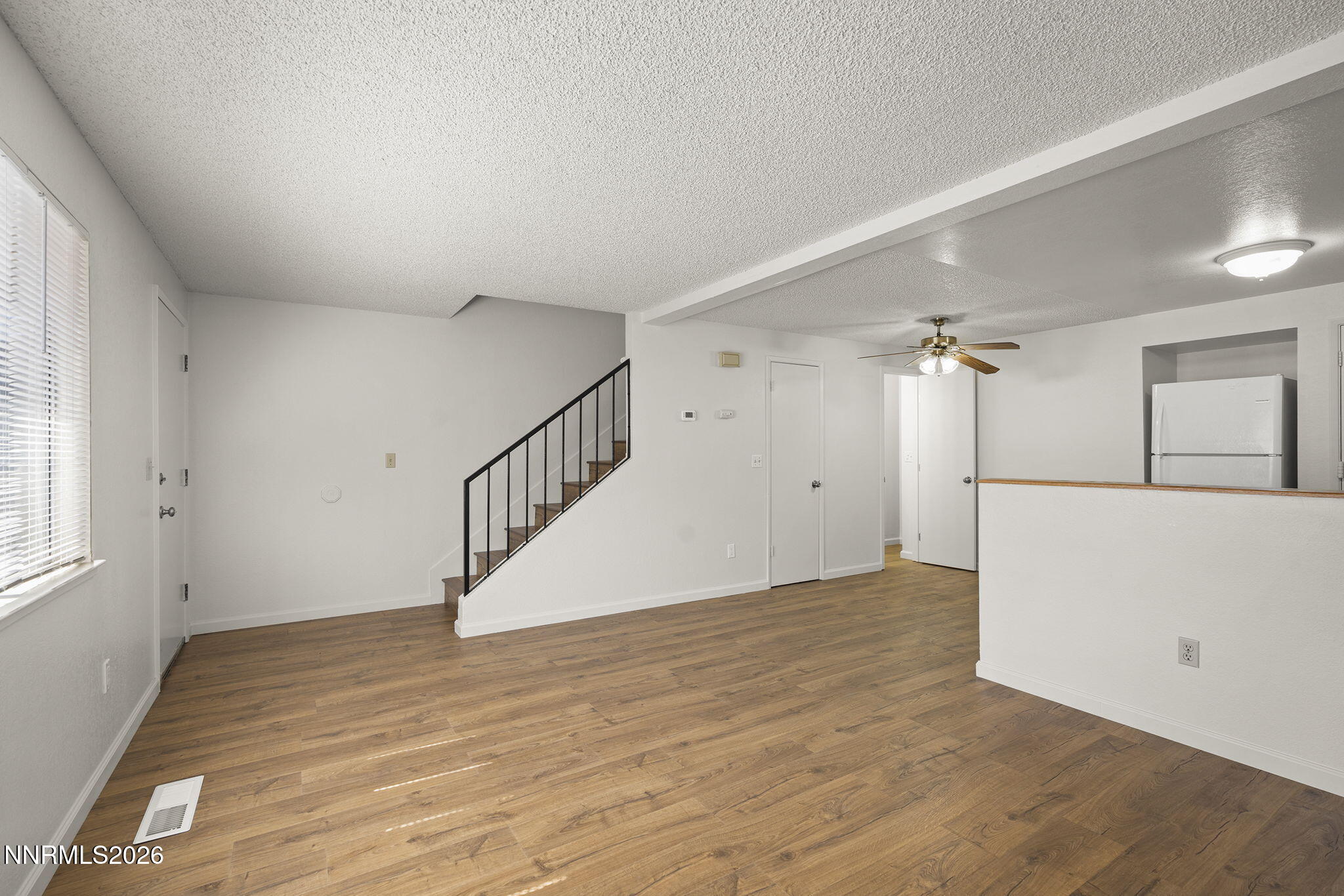 401 Allouette Way, Unit 2 Carson City, NV 89701 - Photo 6 of 29 a view of an entryway with wooden floor