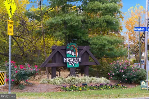 a view of a door with wooden fence