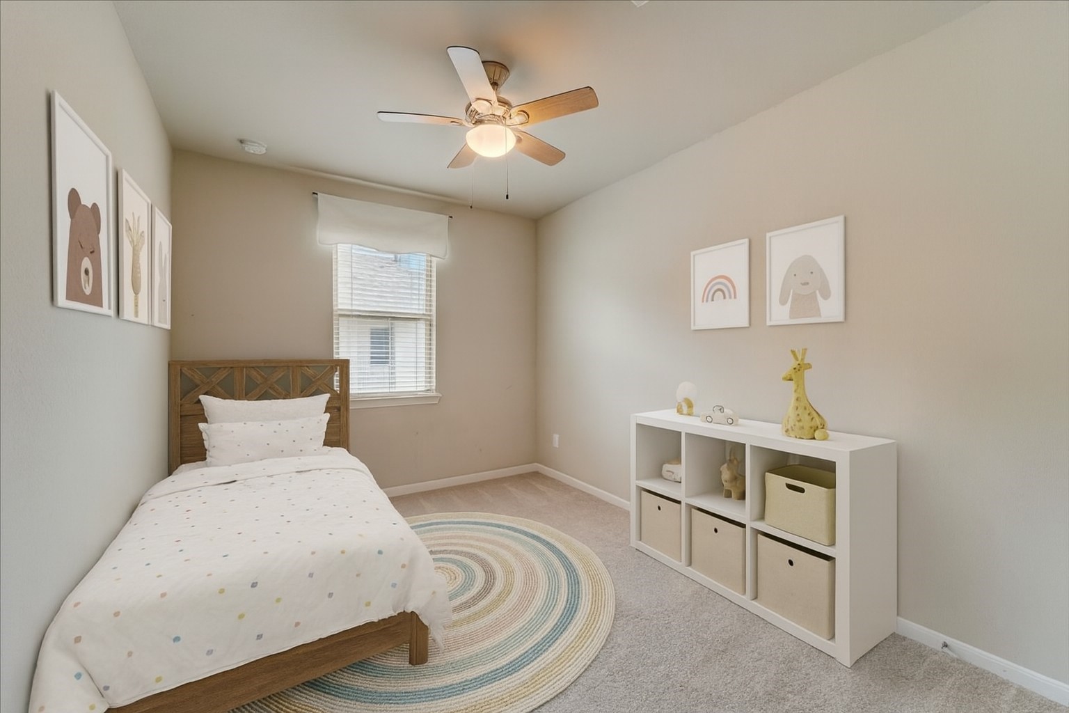 9438 Caddo Ridge Lane Cypress, TX 77433 - Photo 21 of 38 This photo shows a small, carpeted bedroom with neutral walls, a ceiling fan, and a single window with blinds. It's a bright and cozy space, ideal for a secondary bedroom. This is the third of the three bedrooms found on the 2nd floor.
*virtually staged