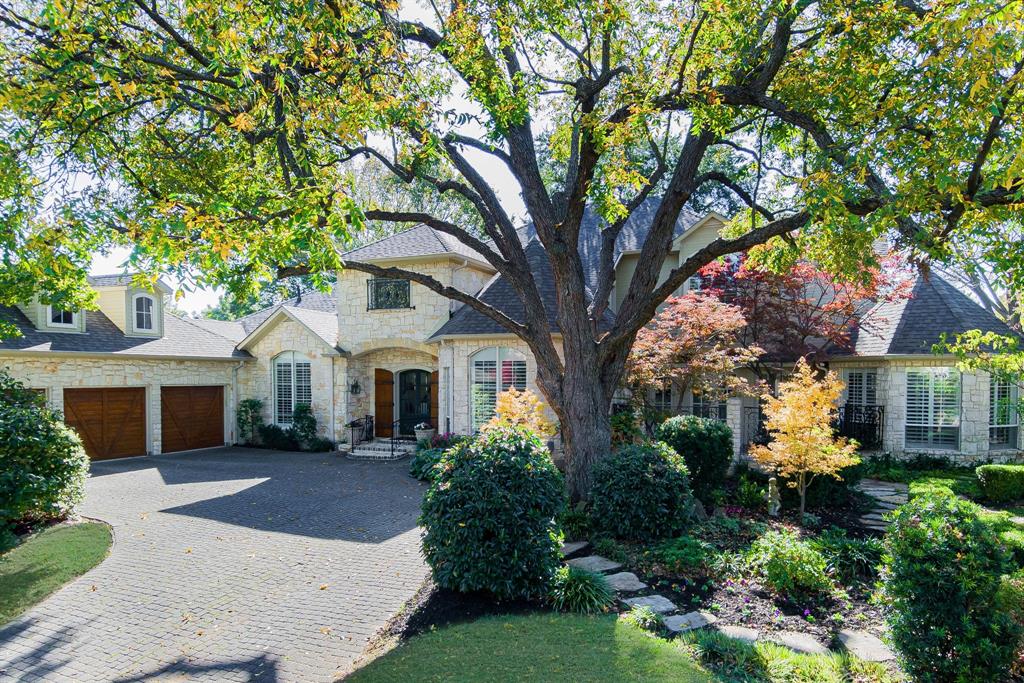 front view of a house with a garden