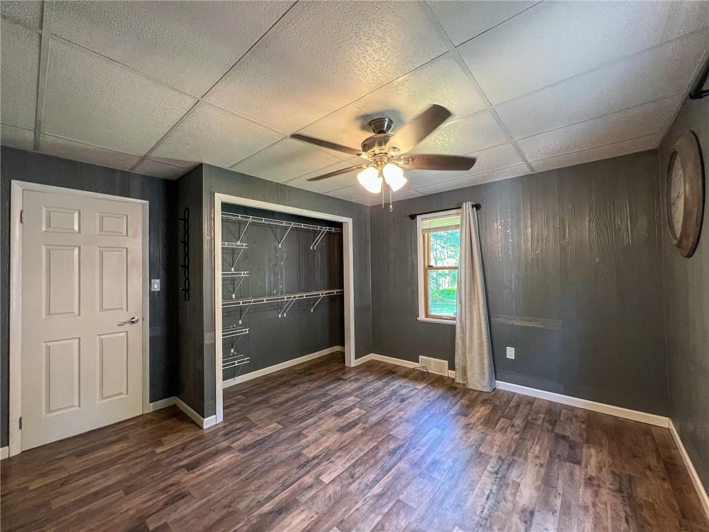 435 Grubb Road Boyers, PA 16020 - Photo 13 of 37 wooden floor in an empty room with a window