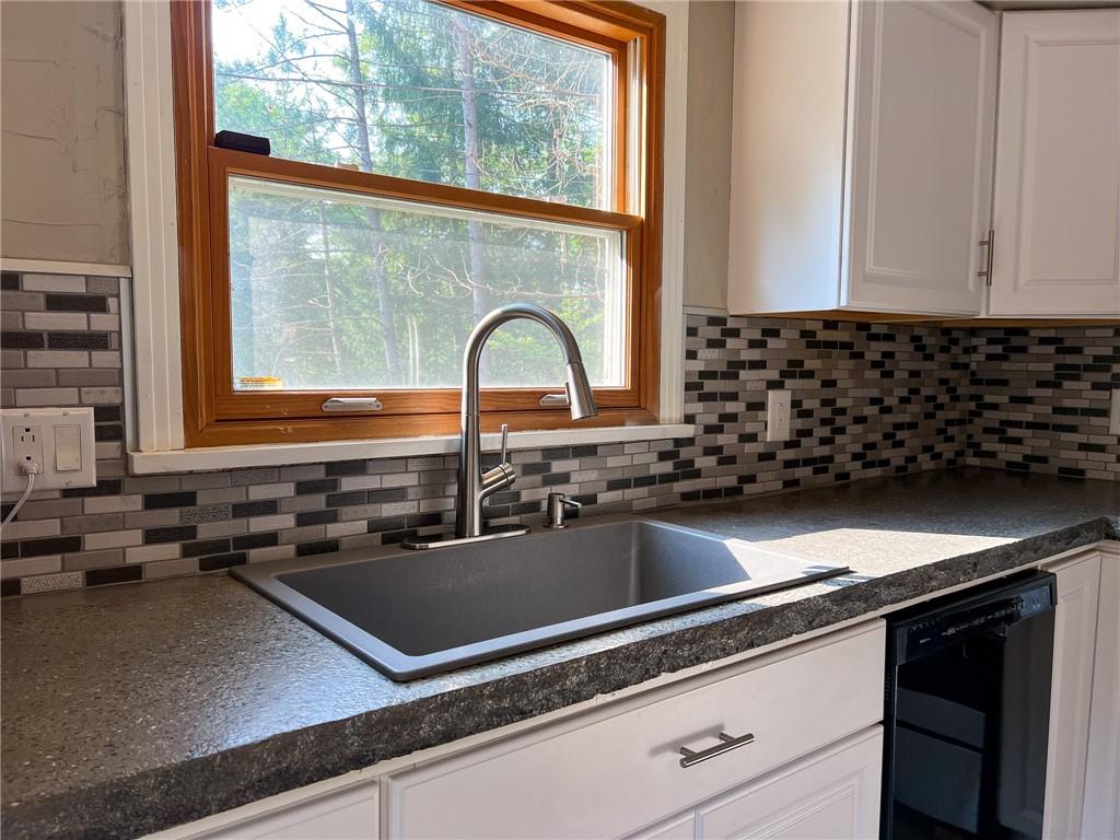435 Grubb Road Boyers, PA 16020 - Photo 10 of 37 a close view of a sink a counter space and utility