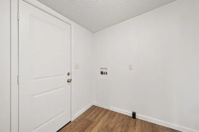 a view of small space with wooden floor