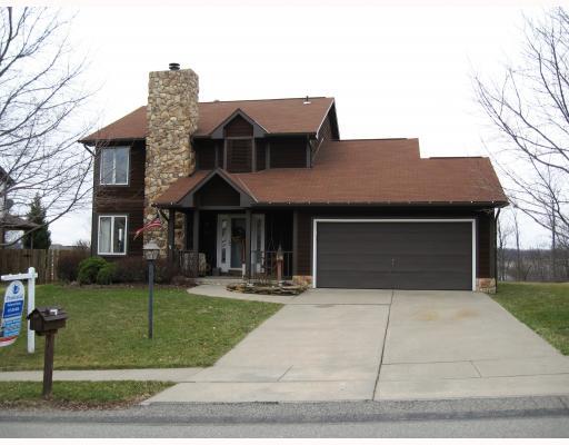 618 Hemlock Road Coraopolis, PA 15108 - Photo 1 of 17 Exterior Front. CUSTOM BUILT STONE AND CEDAR HOME! SIDEWALK COMMUNITY; 2-CAR ATTACHED GARAGE.