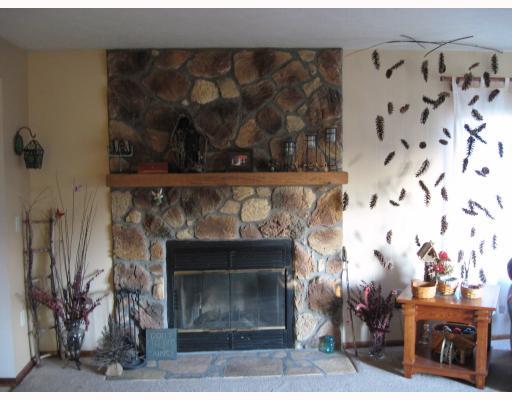 618 Hemlock Road Coraopolis, PA 15108 - Photo 7 of 17 Living Room. 17 x 15 Living Room offers beautiful stone wood-burning fireplace; also the corner windows bring the outside sun shine inside.