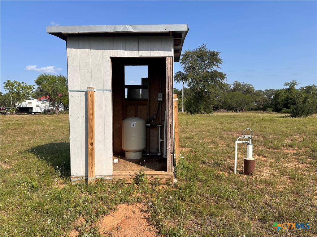 1295 Rainbow Road Cuero, TX 77954 - Photo 7 of 9 a house view with a outdoor space