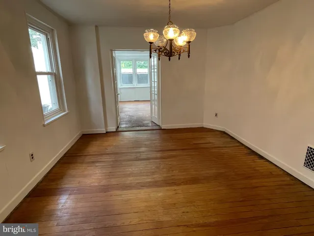 a view of livingroom with hardwood floor and window