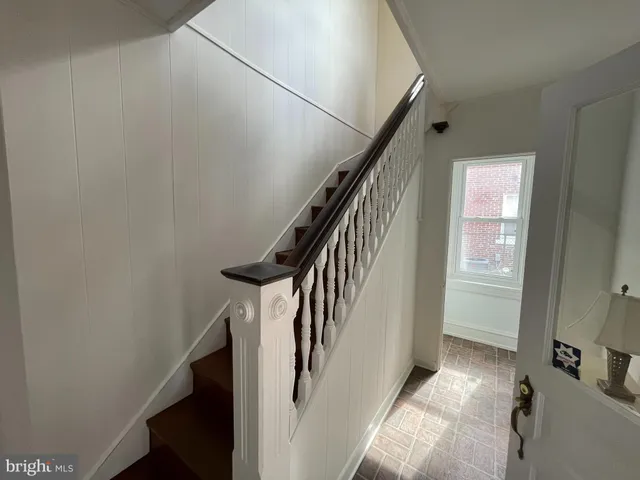 a view of hallway with stairs