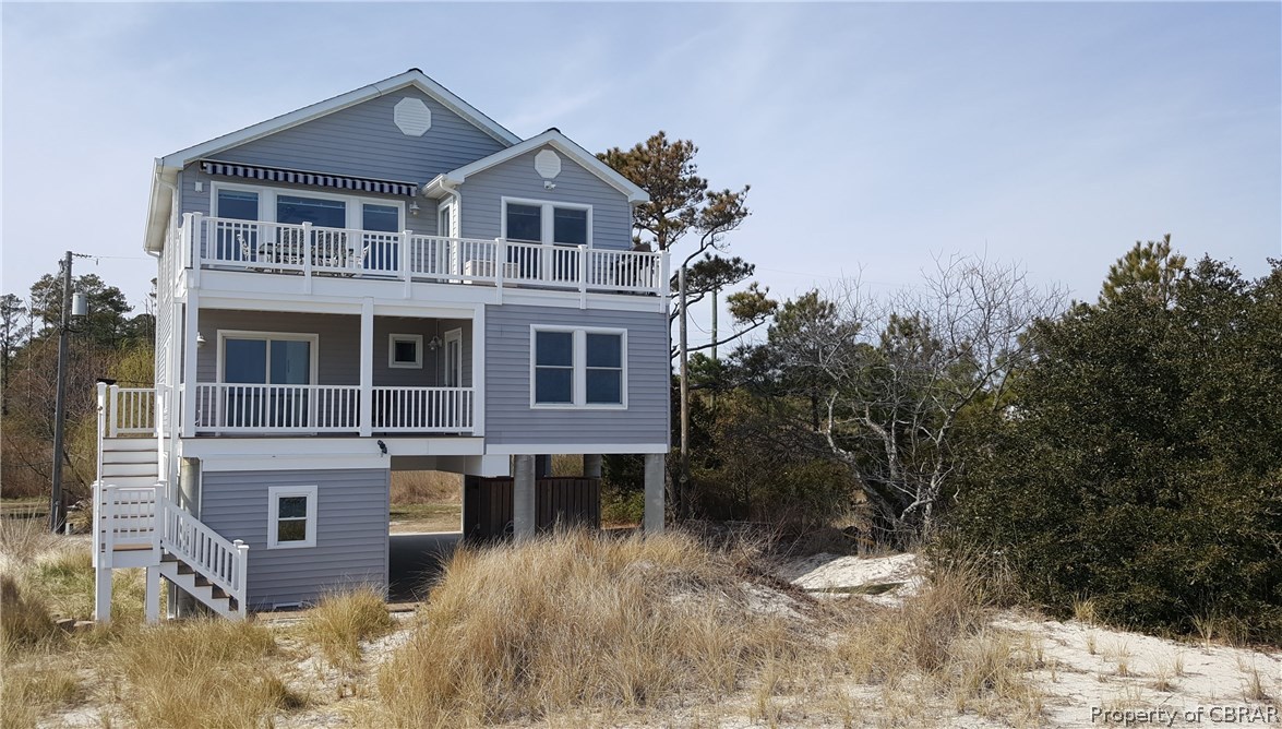 8 Chesapeake Shore Road Port Haywood, VA 23138 - Photo 1 of 26 Classic beach house - decks with wide open views. Spacious outside shower on first level.