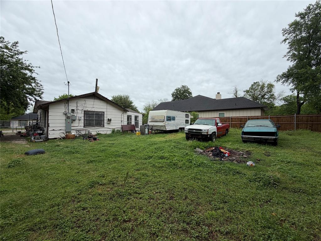 5054 Flamingo Road Fort Worth, TX 76119 - Photo 13 of 15 a aerial view of a house with a big yard