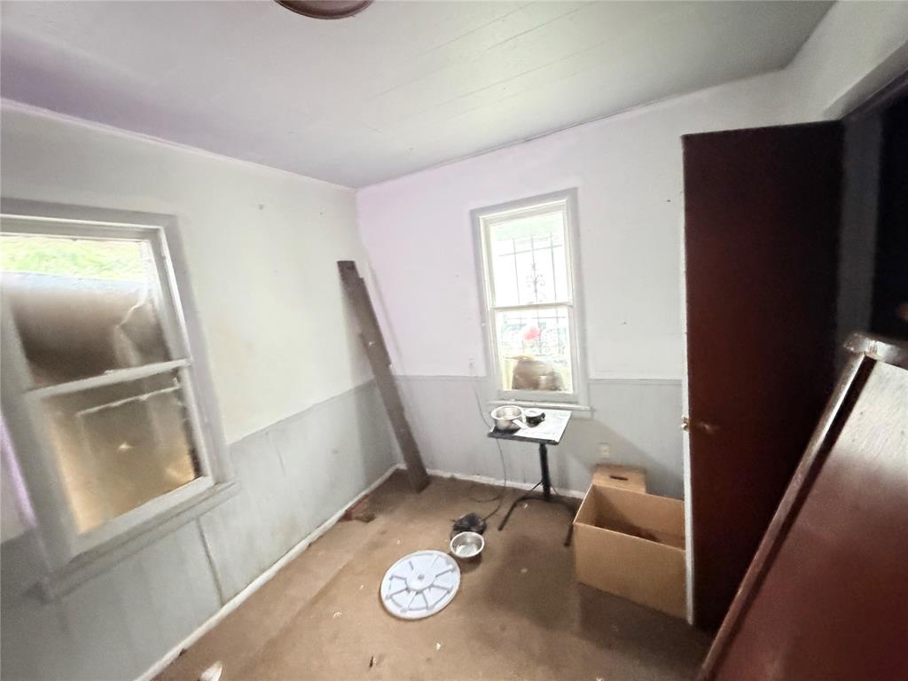 5054 Flamingo Road Fort Worth, TX 76119 - Photo 9 of 15 a living room with furniture and a window