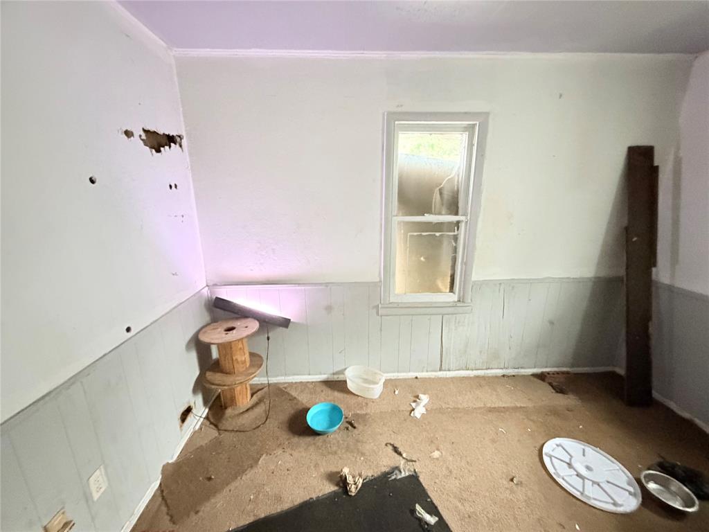 5054 Flamingo Road Fort Worth, TX 76119 - Photo 10 of 15 a bathroom with a sink and a mirror with bathtub