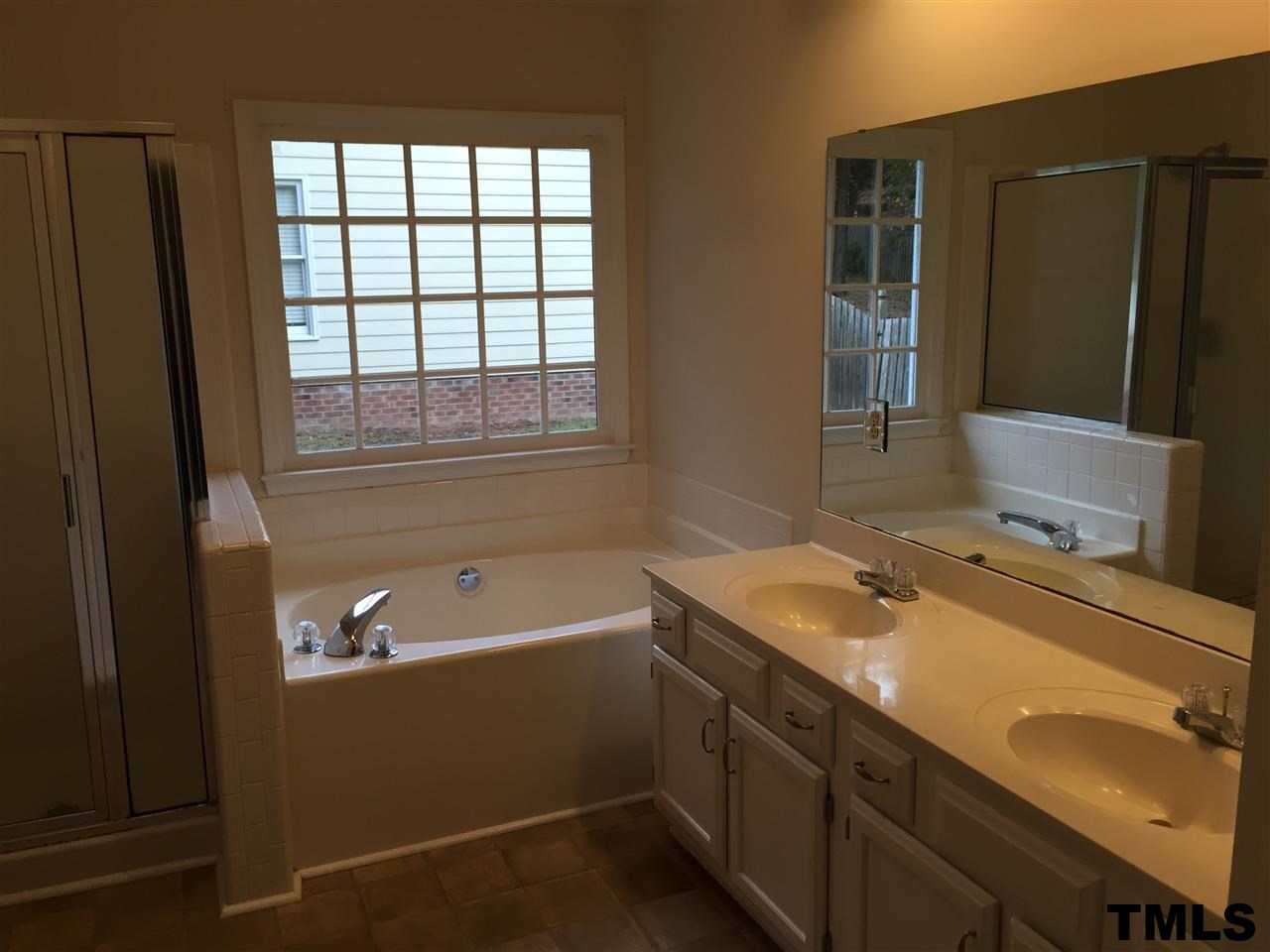 3541 Dechart Lane Raleigh, NC 27616 - Photo 7 of 9 a bathroom with a sink and a bathtub