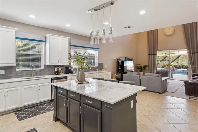 a kitchen with a sink and cabinets
