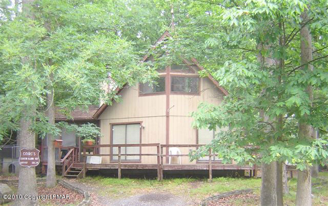 937 Decker Road Bushkill, PA 18324 - Photo 1 of 4 a view of house with backyard and sitting area