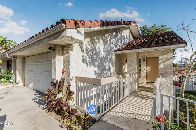 a front view of a house with balcony