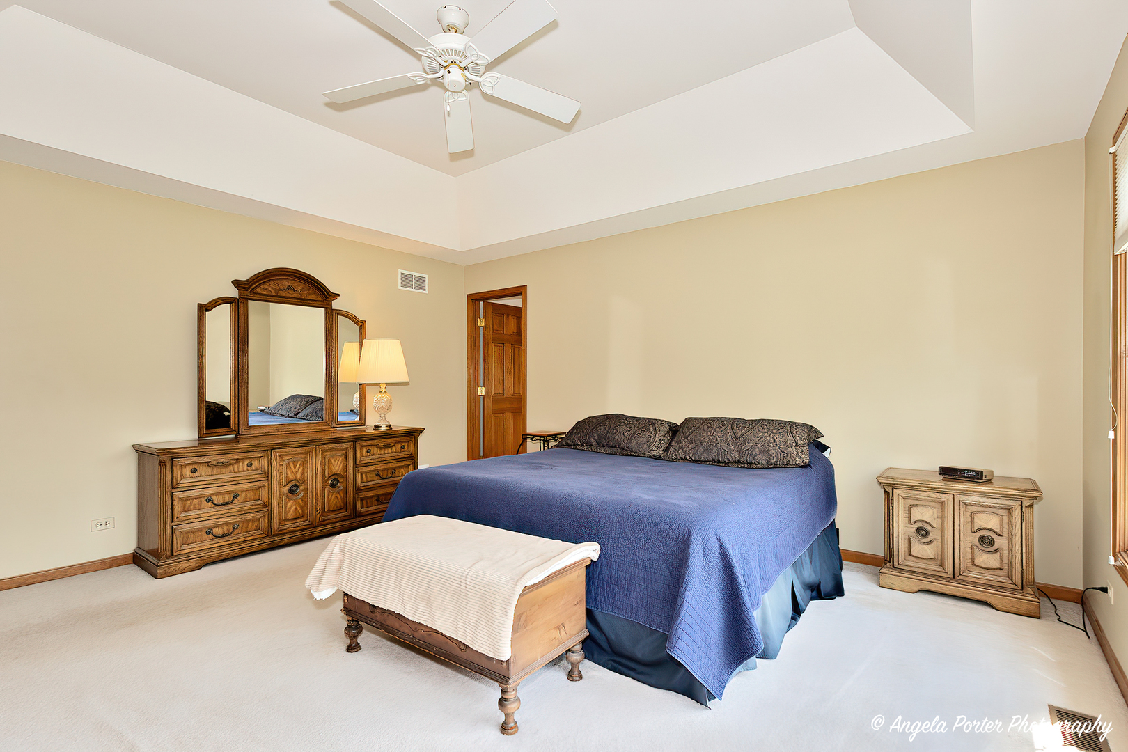 471 White Oaks Drive Cary, IL 60013 - Photo 27 of 39 a bedroom with a bed and a dresser