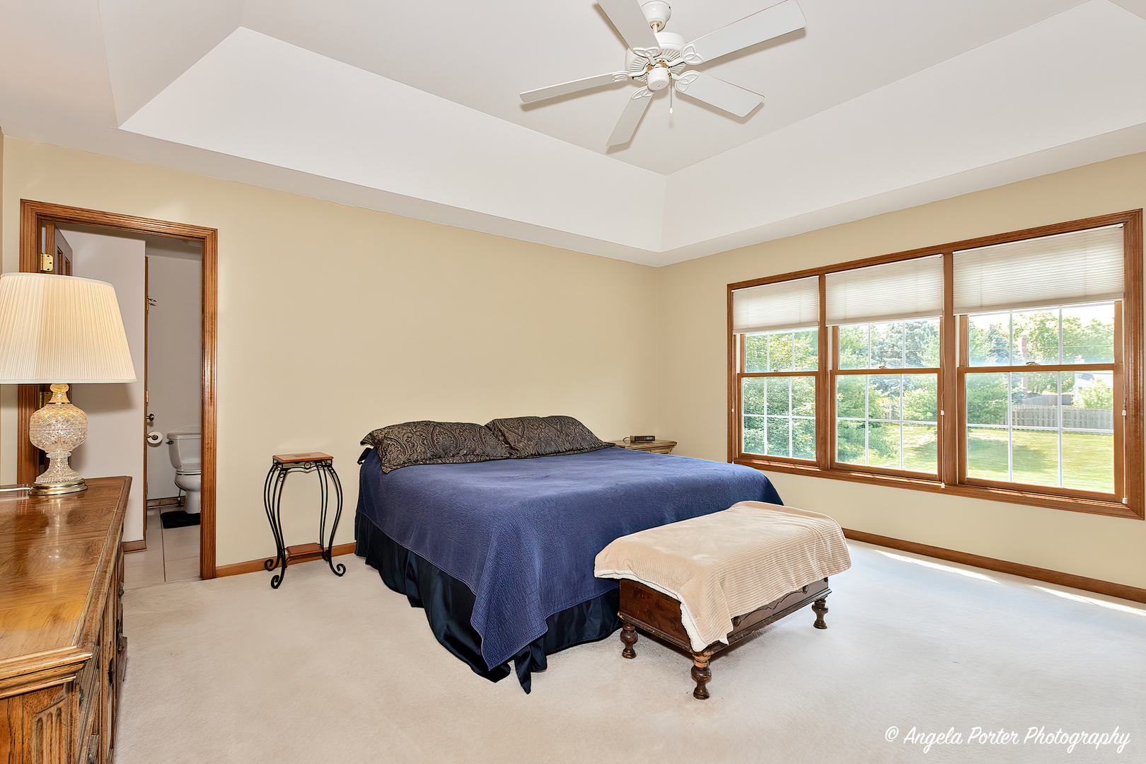 471 White Oaks Drive Cary, IL 60013 - Photo 28 of 39 a bedroom with a large bed and a window